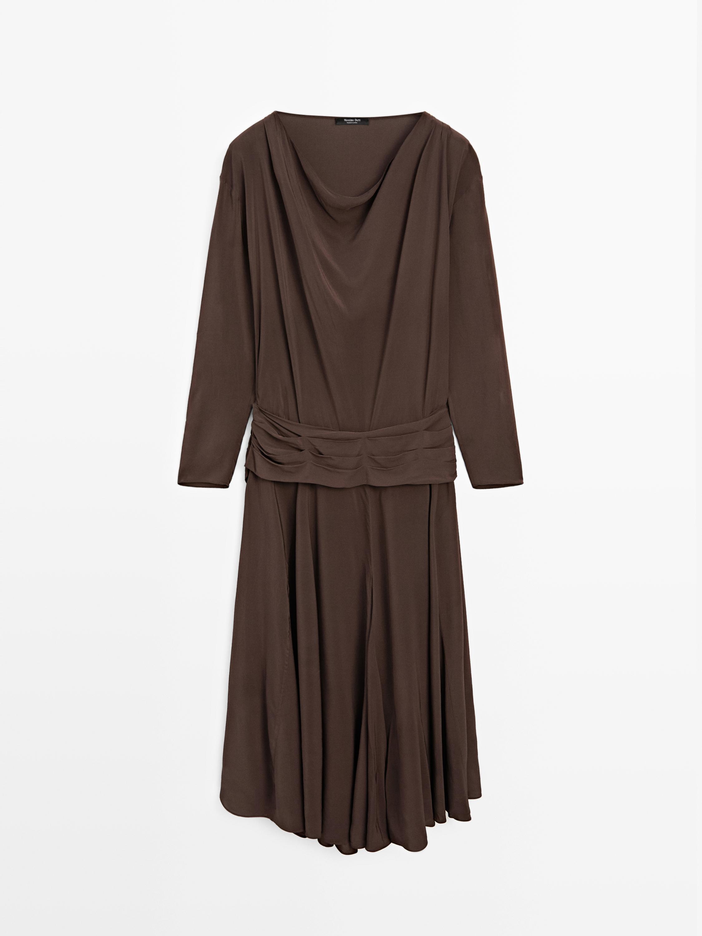 Long flowing dress with draped sash belt